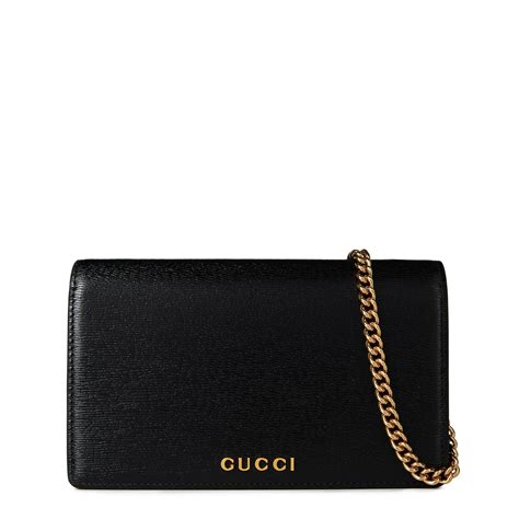 chain wallet with gucci script.